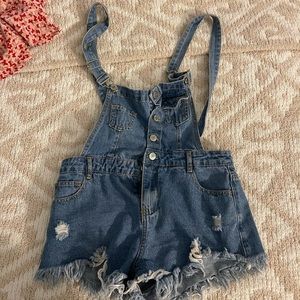 Shot denim overalls